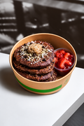Purple Sweet Potato Pancakes with Grass-Fed Whey Protein, Chocolate Chips, Shredded Coconut, Hemp Seeds & House Made Strawberry Compote