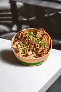 Grilled Chicken Kebab over Fennel Tomato Feta Salad with Pistachios, Cilantro Microgreens & Sourdough Crostini