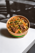 Buckwheat Peanut Noodles with Shredded Sirloin Steak, Carrot, Green Cabbage & Green Onion Sauté