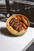 SPECIAL: Locally Sourced Filet Mignon over Raw Cheddar Chive Mashed Potatoes with Slow-Broiled Raw Butter Carrots